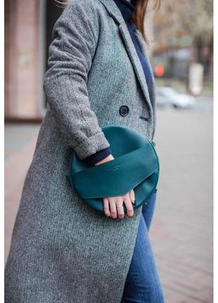 Шкіряна жіноча кругла сумка-рюкзак Maxi зелена з поясом