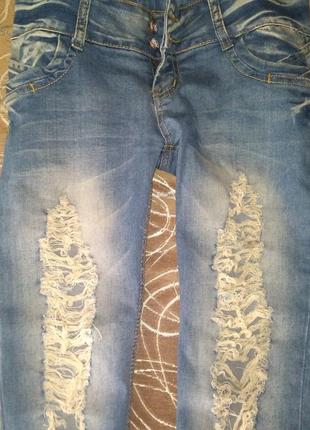 Круті джинси з рваностями