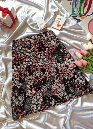 Женская мини-юбка черный цветочный принт.