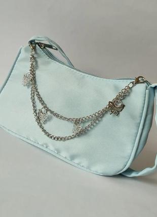 Блакитна сумочка багет з метеликами