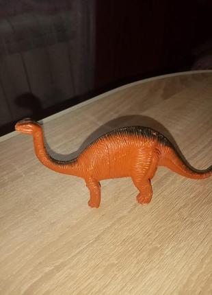 Игрушечная фигурка динозавр