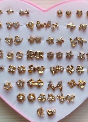 Набор серёжки- гвоздики 36пар разнообразных форм в золотом цвете