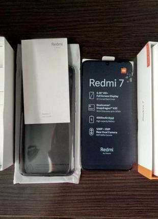 Смартфон Xiaomi Redmi 7 2/16Gb Black Global Version + чехол