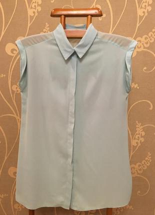 Очень красивая и стильная брендовая блузка мятного цвета.