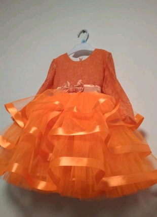 Оранжевое платье для девочки нарядное