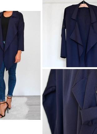 Очень красивый и стильный пиджак-накидка синего цвета.