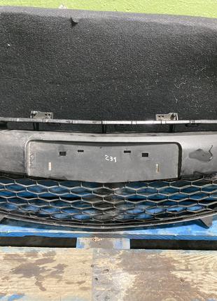 Решетка центральная переднего бампера на Mazda 2 (DE, рестайли...