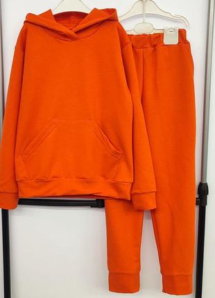 Спортивний помаранчевий костюм для хлопчика/дівчинки 12 років