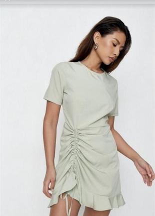 Сукня зі стяжкою фісташкового кольору