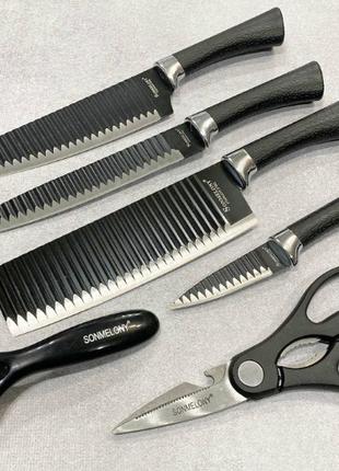 Качественный набор черных кухонных ножей с мраморным покрытием...