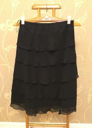 Очень красивая и стильная брендовая юбка с рюшами чёрного цвета.