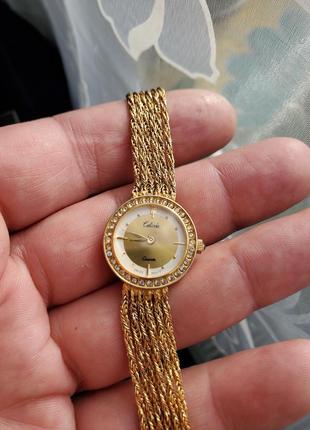 Calinda, изысканные золотистые часы с браслетом