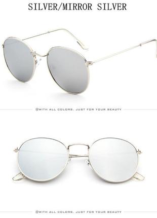 Округлые очки от солнца с тонкой металлической серебряной опра...