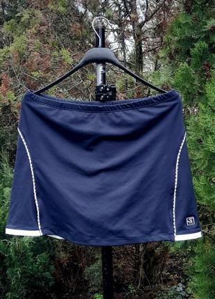 Спортивная темно- синяя юбка с шортами