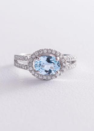 Серебряное помолвочное кольцо с голубым топазом и фианитами 11...