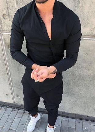 Мужская черная рубашка с застежками на бок