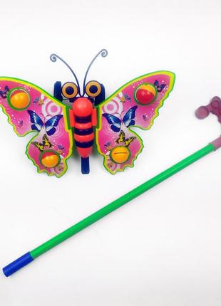 Детская каталка на палочке бабочка 305 машет крыльями (розовый)