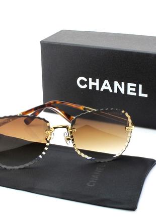 Жіночі окуляри Chanel з коричневим градієнтом
