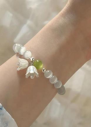 Новий браслет на резинці білі намистини квіти конвалія лілія
