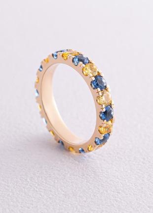 Кольцо с дорожкой голубых и желтых камней (желтое золото) к07106