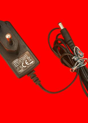 Зарядка AMS195-0900600FV Amigo Switching adapter TP-Link 9v 0.6A