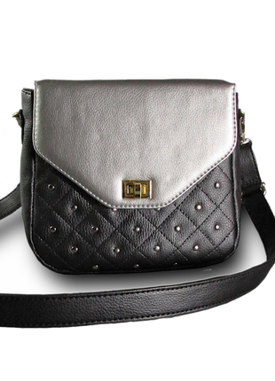 Женская сумочка  комбинированного цвета,черный и серебро.