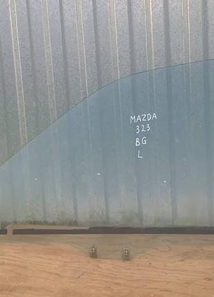 Скло дверей водія Mazda 323 BG