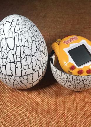 Игрушка электронный питомец Тамагочи в Яйце Динозавра