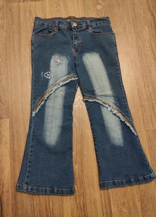 Новые джинсы на девочку 5 лет