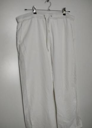 Спортивные штаны белого цвета с подкладкой