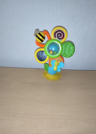 Развивающая игрушка infantino вертушка цветочка