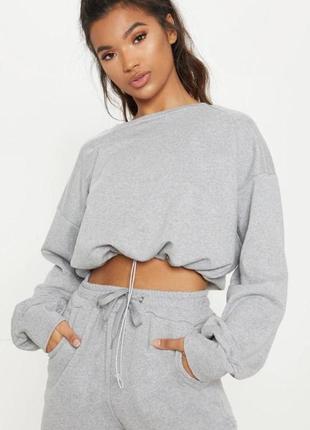 Сірий жіночий короткий светр топ