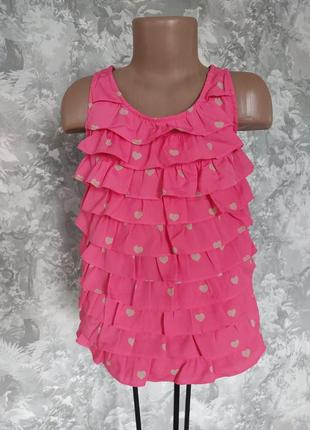 Рожева блуза з рюшами на 6-7 років