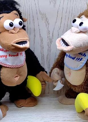 Мягкая интерактивная игрушка K60403 обезьяна с бананом 27см