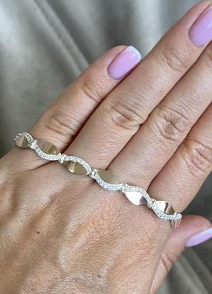 Женский браслет из серебра с золотыми пластинами