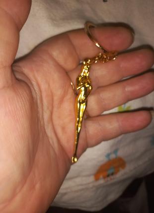 Брелок на ключі золотистий метал 18+ еротики сувенір для дорос...
