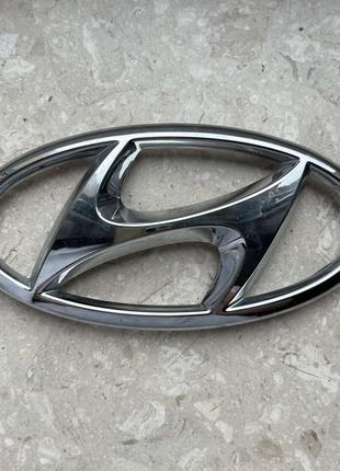 Емблема Hyundai Tucson IV 2020- перед 86300N9010