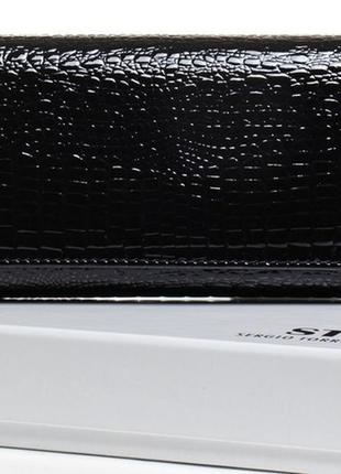 Женский кожаный кошелек на магнитах sergio torretti черный
