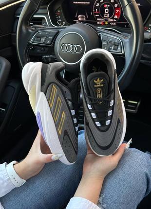 Новые женские черно-белые с золотым кроссовки adidas ozelia da...