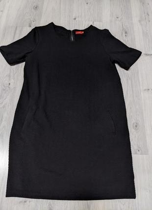 Чорна сукня міді