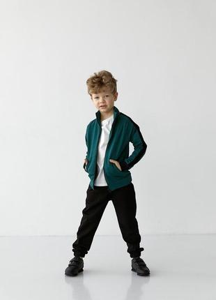 Спортивный костюм на мальчика цвет зеленый с черным р.170 407373