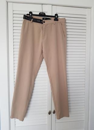 Стильные укороченные брюки брюки mauvaes