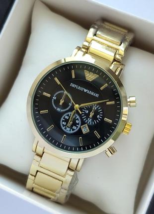 Мужские наручные часы золотистого цвета с черным циферблатом