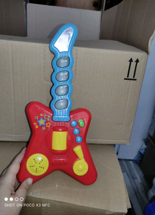 Carousel гитара іграшка з Європи