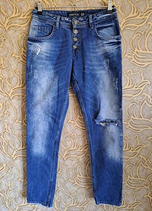 (975) відмінні рвані укорочені джинси poshum original/розмір m
