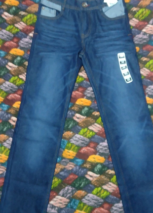 Продам  новые джинсы тёмно-синие 9-10 лет
