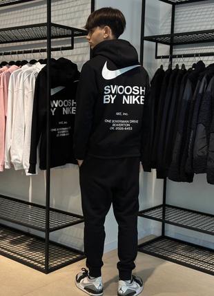 Nike by Swoosh