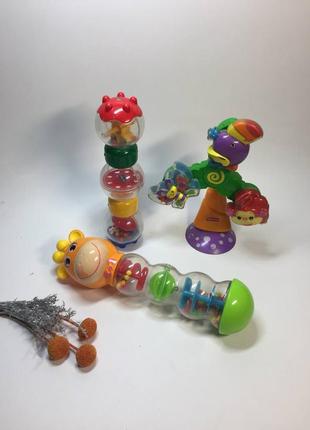 Брязкальце іграшка для малюків жирафка млина та трубка н177