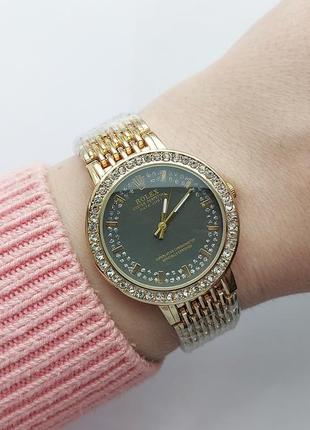 Наручний годинник жіночий в золотому кольорі
