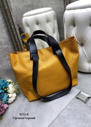 Велика та гарна оранжева жіноча сумка з імітацією плетіння